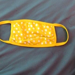 Yellow polka dotted mask
